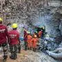 Rescue workers try to reach a 10-year-old boy who got trapped in a narrow well in the backyard of his house in the Piharid village in JanjgirChampa district of Indias Chattisgarh state on June 14, 2022. - Indian emergency workers were scrambling June 14 to rescue a 10-year-old boy with hearing and speech impairments who has been trapped down a narrow well for four days. (Photo by AFP)