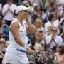 Australia's Ashleigh Barty celebrates after defeating Germany's Angelique Kerber during the women's singles semifinals match on day ten of the Wimbledon Tennis Championships in London, Thursday, July 8, 2021. (AP Photo/Kirsty Wigglesworth)