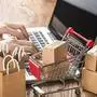 shopping online at home concept.Cartons in a shopping cart on a laptop keyboard