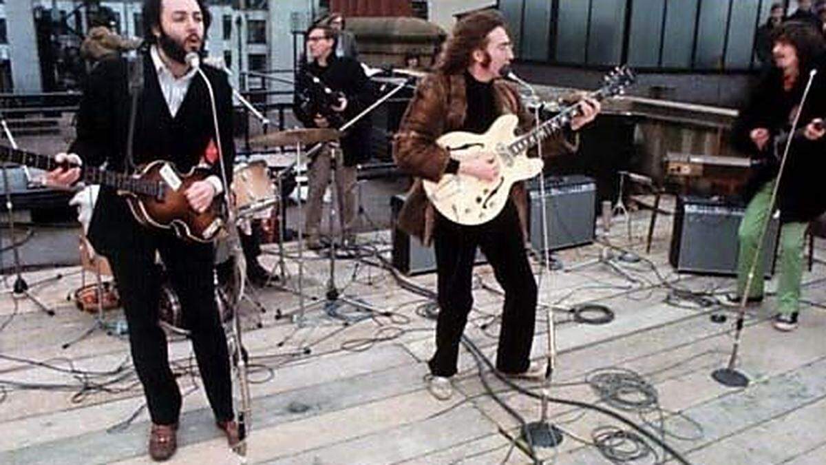 Paul McCartney, George Harrison, John Lennon und Ringo Starr auf dem Dach von Apple-House