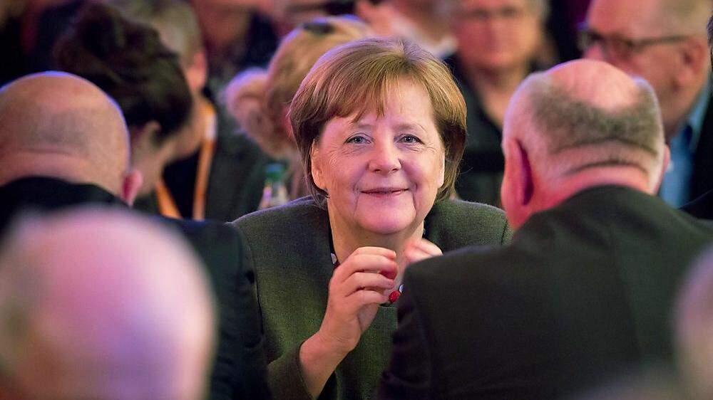 Unter Männern: Angela Merkel 