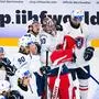 France’s forward #94 Tim Bozon and his brother France’s forward #95 Kevin Bozon comfort France’s goaltender #30 Antoine Keller after loosing 4-3 at overtime during the IIHF Men's Ice hockey World Championship match between Finland and France in Stockholm, on May 11, 2025. (Photo by Jonathan NACKSTRAND / AFP)