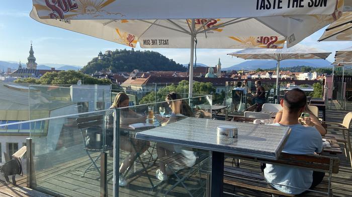 From the Steirerhof roof you can look down to the “Jako” - or across the rooftops to the Schloßberg