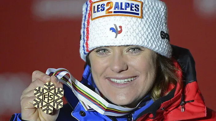 Marion Rolland mit ihrer WM-Medaille