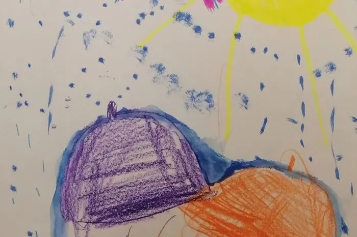 Das bunte Bild mit dem Osterhasen, der sich mit Schirmen vor dem Regen schützt ...