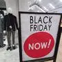 A "Black Friday" sign is posted at a retail location in Philadelphia, Monday, Nov. 21, 2022. Bargain hunting is back with full force heading into the holidays. But inflation is limiting how much of a deal consumers will be getting. (AP Photo/Matt Rourke)