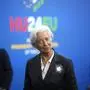 European Central Bank President Christine Lagarde, center, arrives for an EU Summit at the Puskas Arena in Budapest, Hungary, Friday, Nov. 8, 2024. (AP Photo/Petr David Josek)