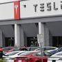 Tesla profit doubles as car deliveries surge
