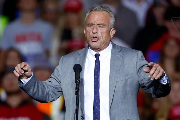 Former Republican presidential candidate Robert F. Kennedy Jr. gestures as he speaks ahead of Former US President and Republican presidential candidate Donald Trump at a campaign rally at the Fiserv Forum in Milwaukee, Wisconsin, November 1, 2024. (Photo by KAMIL KRZACZYNSKI / AFP)