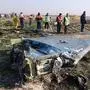Rescue teams are seen on January 8, 2020 at the scene of a Ukrainian airliner that crashed shortly after take-off near Imam Khomeini airport in the Iranian capital Tehran. - Search-and-rescue teams were combing through the smoking wreckage of the Boeing 737 flight from Tehran to Kiev but officials said there was no hope of finding anyone alive. The vast majority of the passengers on the Ukraine International Airlines flight were non-Ukrainians, including 82 Iranians and 63 Canadians, officials said. (Photo by Akbar TAVAKOLI / IRNA / AFP)
