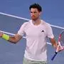 Austria's Dominic Thiem reacts after winning the third set against Canada's Felix Auger-Aliassime during their men's singles match on day two of the Australian Open tennis tournament in Melbourne on January 15, 2024. (Photo by WILLIAM WEST / AFP) / -- IMAGE RESTRICTED TO EDITORIAL USE - STRICTLY NO COMMERCIAL USE --