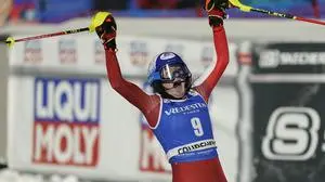 Austria's Katharina Truppe reacts after completing an alpine ski, women's World Cup slalom, in Courchevel, France, Thursday, Dec. 21 2023. (AP Photo/Giovanni Auletta)
