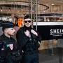 Shein Opens Its First Store In Paris Riot police officers stand guard as people protest in front of the BHV department store in Paris, France, on November 5, 2025, on the opening day of Asian e-commerce giant Shein s first physical store outside the Bazar de l Hotel de Ville BHV department store. Asian e-commerce giant Shein pledges on November 4, 2025, to cooperate fully with French judicial authorities after an uproar over it selling childlike sex dolls and says it is prepared to disclose the names of people who bought them. The controversy comes as the online fast-fashion seller is set to open its first bricks and mortar store in the world in the prestigious BHV department store in central Paris. Paris France PUBLICATIONxNOTxINxFRA Copyright: xJeromexGillesx originalFilename: chobeaux-shein251105_npuJd.jpg