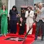 (L/R) Sarah Zurell, director Patty Jenkins, actress Christina Ricci, actor Dan Bucatisky and President and CEO of the Hollywood Walk of Fame Steven Nissen react as Ricci's Hollywood Walk of Fame star is unveilled in Hollywood, California, on March 6, 2025. (Photo by Frederic J. BROWN / AFP)