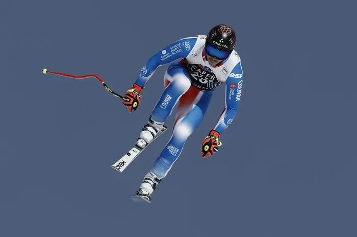 France's Nils Alphand speeds down the course during an alpine ski, men's World Cup downhill training, in Crans Montana, Switzerland, Friday, Feb. 21, 2025. (AP Photo/Gabriel Facciotti)