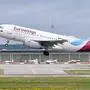 An Airbus A319-132 of German airline Eurowings takes off from Stuttgart Airport in Leinfelden-Echterdingen near Stuttgart, southwestern Germany, on July 28, 2023. (Photo by THOMAS KIENZLE / AFP)