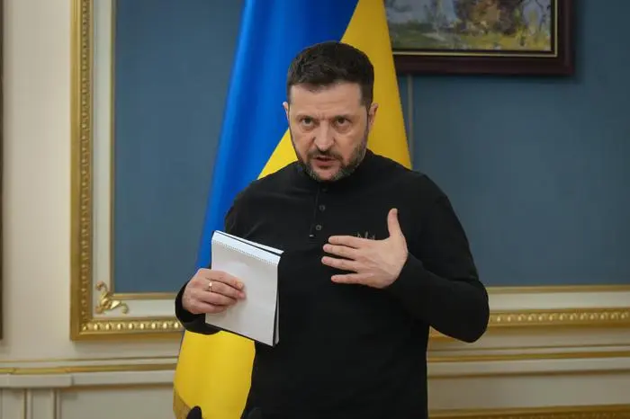 Ukrainian President Volodymyr Zelenskyy speaks during a briefing in Kyiv, Ukraine, Tuesday, March 25, 2025. (AP Photo/Efrem Lukatsky)