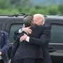 US President Joe Biden hugs his son Hunter Biden upon arrival at Delaware Air National Guard Base in New Castle, Delaware, on June 11, 2024, as he travels to Wilmington, Delaware. A jury found Hunter Biden guilty on June 11 on federal gun charges in a historic first criminal prosecution of the child of a sitting US president. The 54-year-old son of President Joe Biden was convicted on all three of the federal charges facing him, CNN and other US media reported. (Photo by ANDREW CABALLERO-REYNOLDS / AFP)