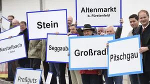 Kritiker an der Gemeindestrukturreform (bei der Regierungsklausur in Schladming im Jahr 2014)