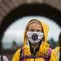 TOPSHOT - Swedish climate activist Greta Thunberg protests during a "Fridays for Future" protest in front of the Swedish Parliament Riksdagen in Stockholm on October 9, 2020. (Photo by Jonathan NACKSTRAND / AFP)