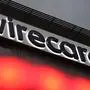 The logo of German payments provider Wirecard is seen at a building of the company's headquarters in Aschheim near Munich, southern Germany, on September 2, 2020. - Germany is poised to launch a full parliamentary inquiry into the collapse of payments provider Wirecard, as questions mount on how the government failed to prevent the country's biggest post-war financial scandal. After grilling members of Chancellor Angela Merkel's cabinet behind closed doors, opposition lawmakers on parliament's finance committee said they have no choice but to up the ante and seek a full inquiry. (Photo by Christof STACHE / AFP)