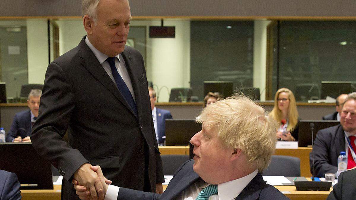 Johnson (vorne) und Ayrault