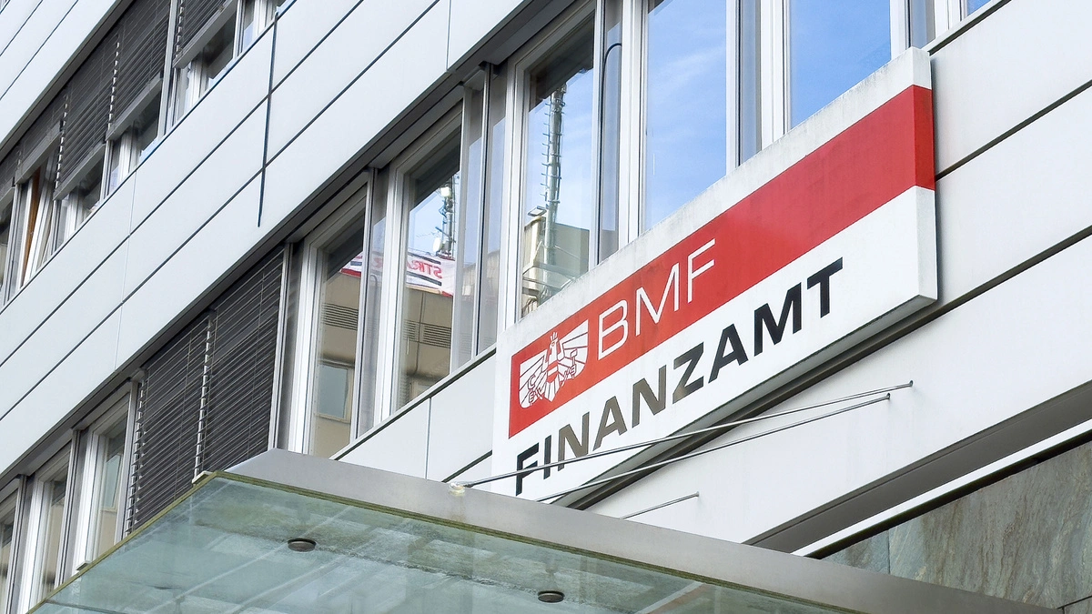 Modern bmf finanzamt office building exterior in urban setting.