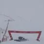 A snowcat clears the finish area of the course of an alpine ski, men's World Cup downhill race after it was canceled, in Cervinia-Zermatt, Saturday, Nov. 11, 2023. The inaugural World Cup downhill at the storied Matterhorn mountain will have to wait at least one more day after a race Saturday was canceled because of heavy snowfall and strong winds. Race organizers called off plans for the men's downhill soon after 6 a.m. local time at the new Gran Becca course that starts in Switzerland and finishes in Italy. (AP Photo/Alessandro Trovati)