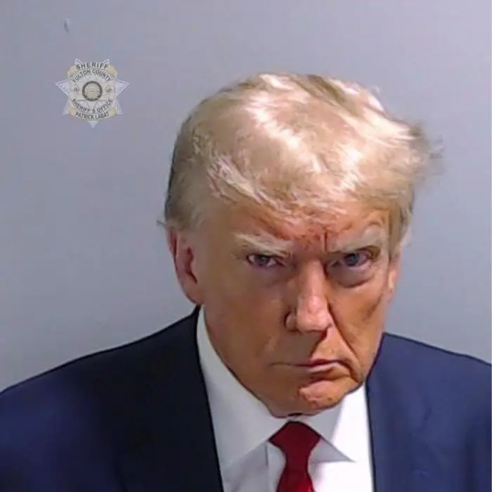 This booking photo provided by the Fulton County Sheriff’s Office shows former President Donald Trump on Thursday, Aug. 24, 2023, after he surrendered and was booked at the Fulton County Jail in Atlanta. Trump is accused by Fulton County District Attorney Fani Willis of attempting to subvert the will of Georgia voters in a bid to keep Joe Biden out of the White House. (Fulton County Sheriff’s Office via AP)