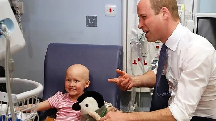 Prinz William mit der kleinen Daisy