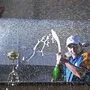 Champagner-Dusche nach Sieg