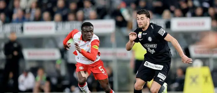Gizo Mamageishvili im Laufduell mit Soumaila Diabate