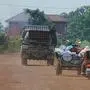 Cambodians drive behind a military vehicle for evacuation in Oddar Meanchey province, Cambodia, Friday, July 25, 2025, as Thai and Cambodian soldiers have clashed along the border between their countries in a major escalation. (AP Photo/Heng Sinith)
