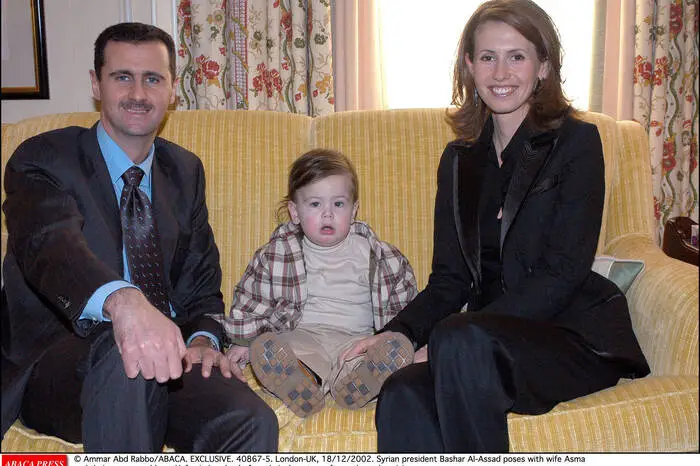 Baschar und Asma al-Assad mit dem damals einjährigen Sohn Hafez 2002 in London