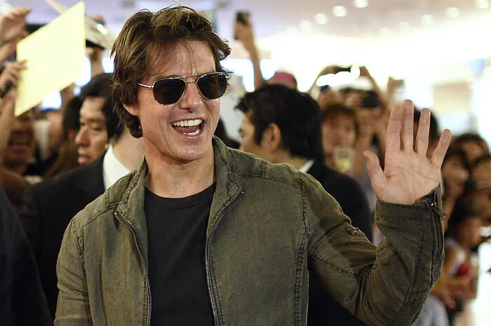 ... und Tom Cruise sind beide Linkshänder.