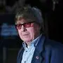 Former member of the legendary British band The Rolling Stones, Bill Wyman, arrives for the world premiere of "Crossfire Hurricane", a documentary about the rock group, in London's Leicester Square on October 18, 2012. AFP PHOTO/CARL COURT (Photo by CARL COURT / AFP)