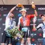 ABD0135_20240616 - KLAGENFURT - ÖSTERREICH: v.l. Arthur Horseau (FRA, 2. Platz), Sieger Denis Chevrot (FRA), Jon Saeveraas Breivold (NOR, 3. Platz) während der Siegerehrung des Ironman Austria am Sonntag, 17. Juni 2024 in Klagenfurt. - FOTO: APA/EXPA/JOHANN GRODER