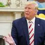 US President Donald Trump speaks during a meeting with  Romania's President Klaus Iohannis in the Oval Office of the White House in Washington, DC on August 20, 2019. (Photo by MANDEL NGAN / AFP)
