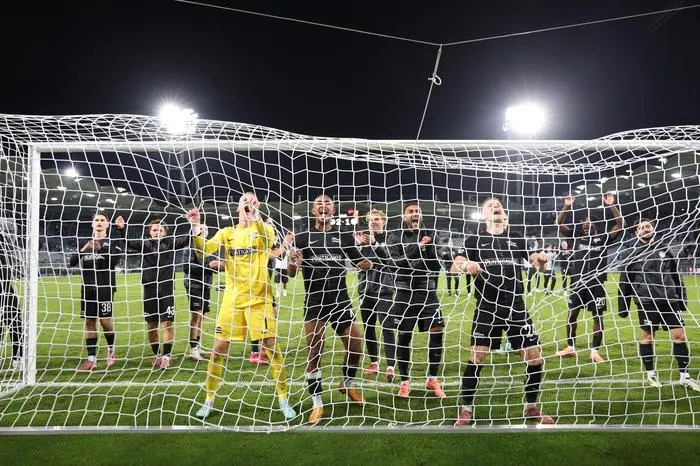 GRAZ,AUSTRIA,02.OCT.25 - SOCCER - UEFA Europa League, SK Sturm Graz vs Glasgow Rangers FC. Image shows the rejoicing of Oliver Christensen, Emanuel Aiwu and Dimitri Lavalee (Sturm).
Photo: GEPA pictures/ Chris Bauer