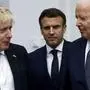 From left, Britain's Prime Minister Boris Johnson, French President Emmanuel Macron and U.S. President Joe Biden arrive for a G7 leaders' group photo during a NATO summit in Brussels, Thursday March 24, 2022. (Henry Nicholls/Pool via AP)