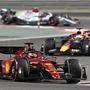 Ferrari's Monegasque driver Charles Leclerc (foreground) drives during the Bahrain Formula One Grand Prix at the Bahrain International Circuit in the city of Sakhir on March 20, 2022. (Photo by OZAN KOSE / AFP)