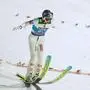 Stephan Embacher, of Austria, lands his qualification jump at the second stage of the Four Hills ski jumping tournament in Garmisch-Partenkirchen, Germany, Wednesday, Dec. 31, 2025. (AP Photo/Matthias Schrader)