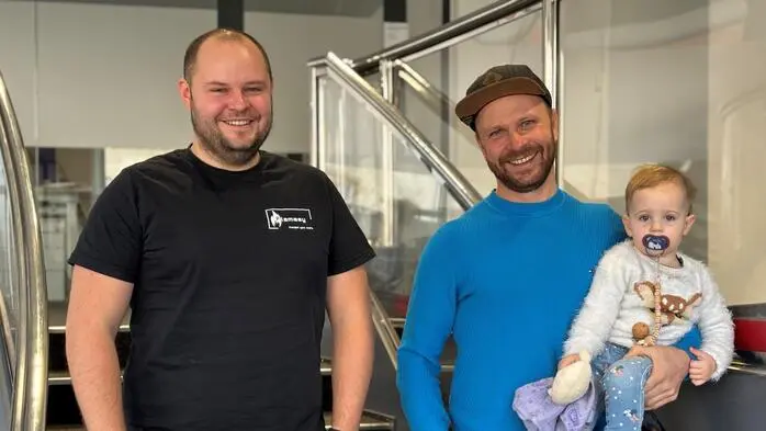 Berni Reinwald und Christian Dorner mit seiner Tochter