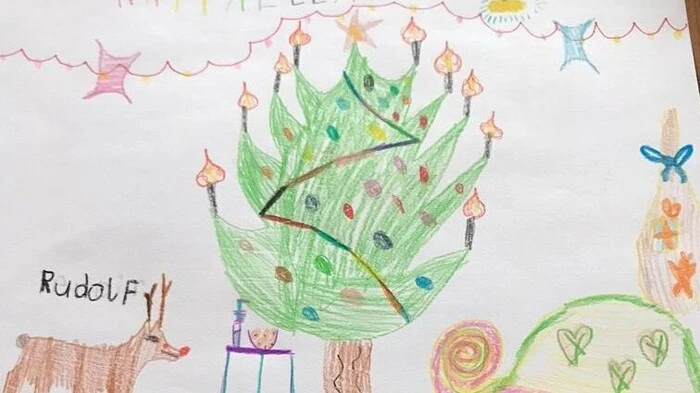 Valentina (8 Jahre) und Raffaella (6 Jahre) Sabella wünschen mit ihren Bildern den Verwandten Frohe Weihnachten.