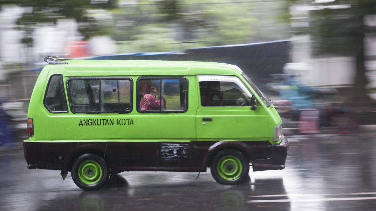 Bogor Indonesia Angkot local minibus PUBLICATIONxINxGERxSUIxAUTxHUNxONLY