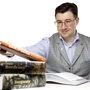 Der aus Osttirol stammende Sommelier André Cis blättert in Kochbüchern und macht Notizen
