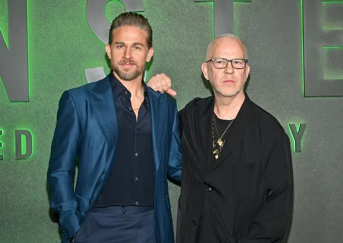 Charlie Hunnam, left, and Ryan Murphy attend the world premiere of Netflix's 
