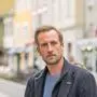 Bernhard Bauer, Obmann der Grazer Wirtschaftskammer, mit blauem Pullover und Jacke darüber