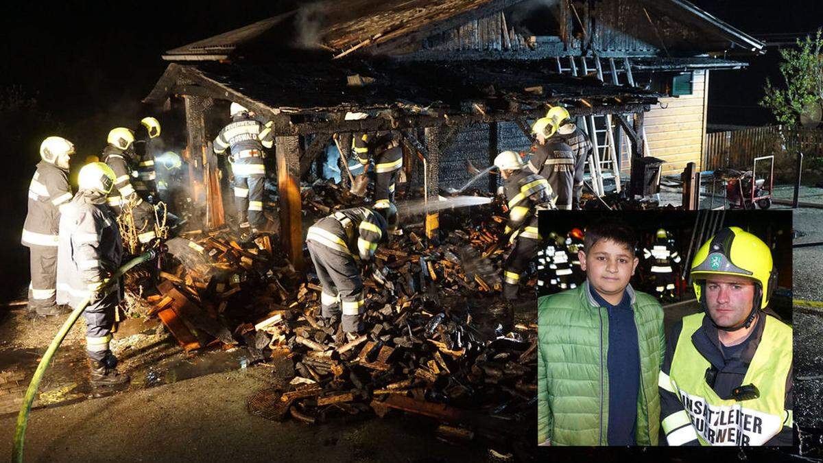 Der zwölfjährige Slavik Manukyan mit dem Einsatzleiter der Feuerwehr