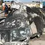 TOPSHOT - This handout photograph taken and released on January 11, 2019, by The National Security and Defense Council of Ukraine, shows people standing and analysing the fragments and remains of the Ukraine International Airlines plane Boeing 737-800 that crashed outside the Iranian capital Tehran on January 8, 2020. - Iran said on January 11, 2020 it "unintentionally" shot down a Ukrainian passenger jet, killing all 176 people aboard, in an abrupt about-turn after initially denying Western claims it was struck by a missile. Iranian president said a military probe into the tragedy had found "missiles fired due to human error" brought down the Boeing 737, calling it an "unforgivable mistake". (Photo by STR / National Security and Defense Council of Ukraine / AFP) / RESTRICTED TO EDITORIAL USE - MANDATORY CREDIT "AFP PHOTO /  National Security and Defense Council of Ukraine" - NO MARKETING NO ADVERTISING CAMPAIGNS - DISTRIBUTED AS A SERVICE TO CLIENTS
